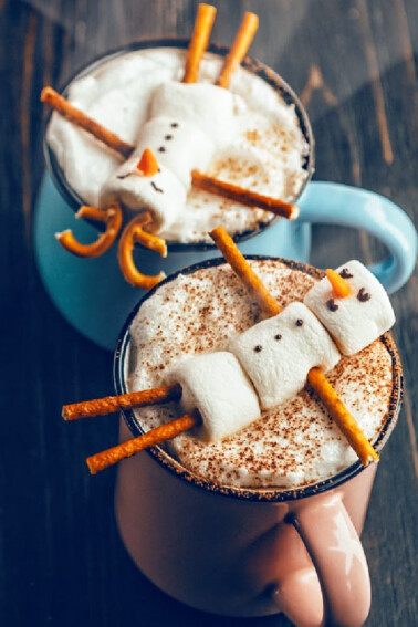 marshmallow snowman floating in hot chocolate - Kids Activities Blog