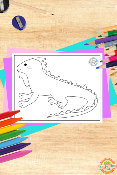 Iguana coloring page printed pdf on wood background with coloring supplies- kids activities blog